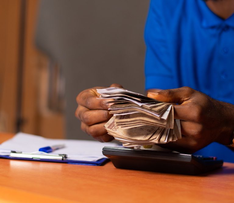 Nigerian Man Counting Money